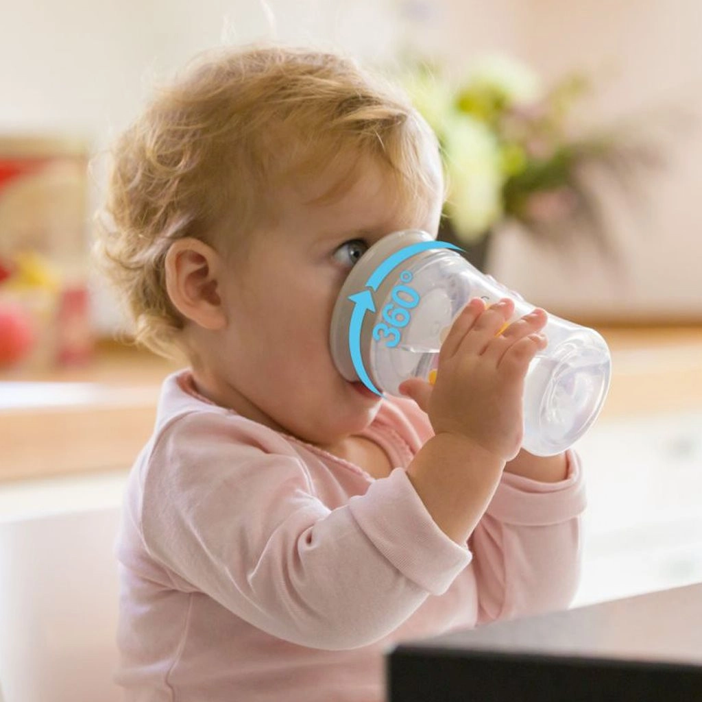 Dětský hrneček Magic Nuk 360 ° s víčkem - červený