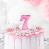 Rózsaszín születésnapi gyertya 7-es számmal és szegéllyel – tortadísz