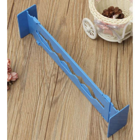 Nastaviteľná prepážka do zásuvky